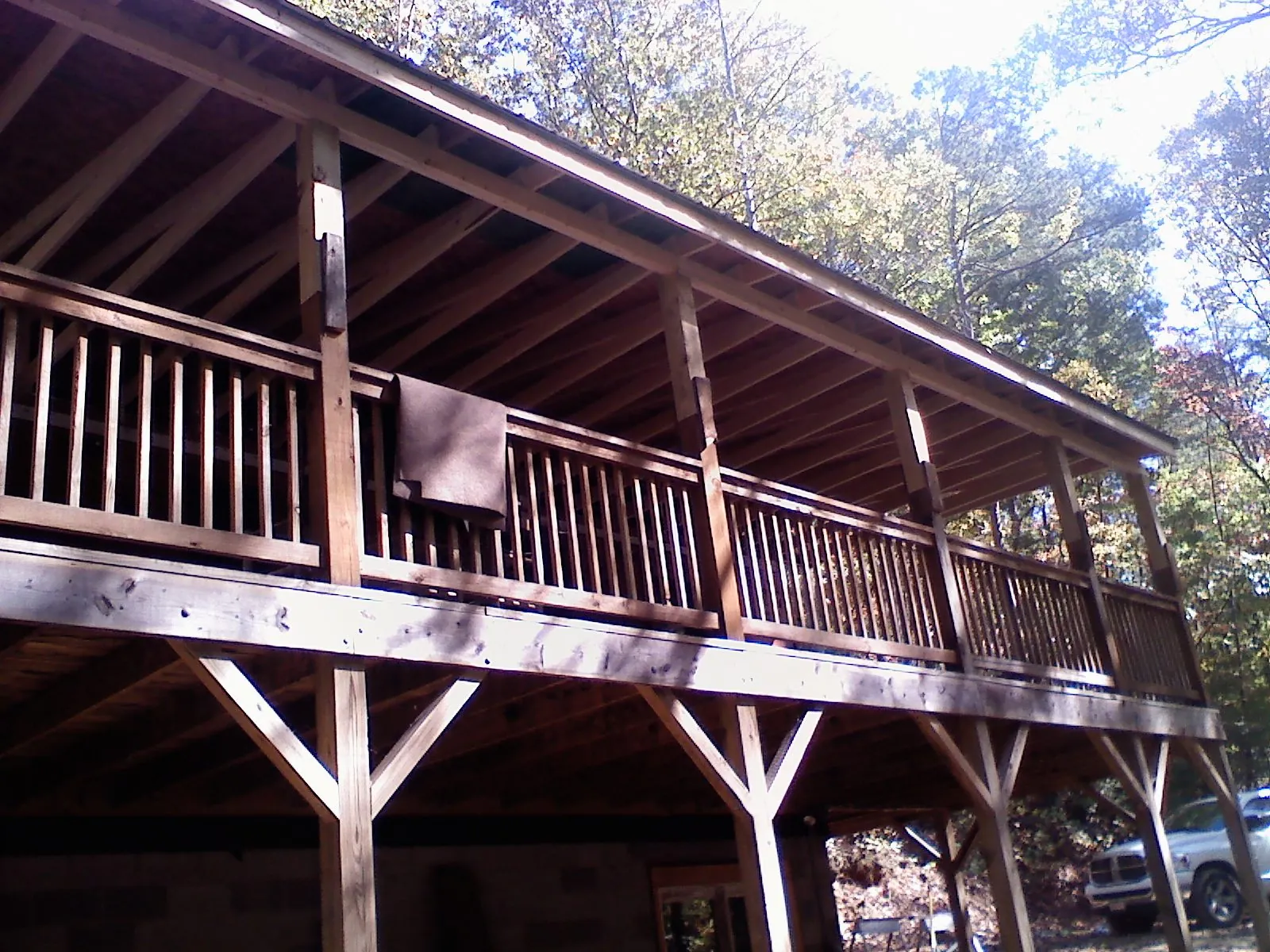Timber framing under a new elevated porch and deck — Roof Leak Repair in Norfolk by Roofing Brothers